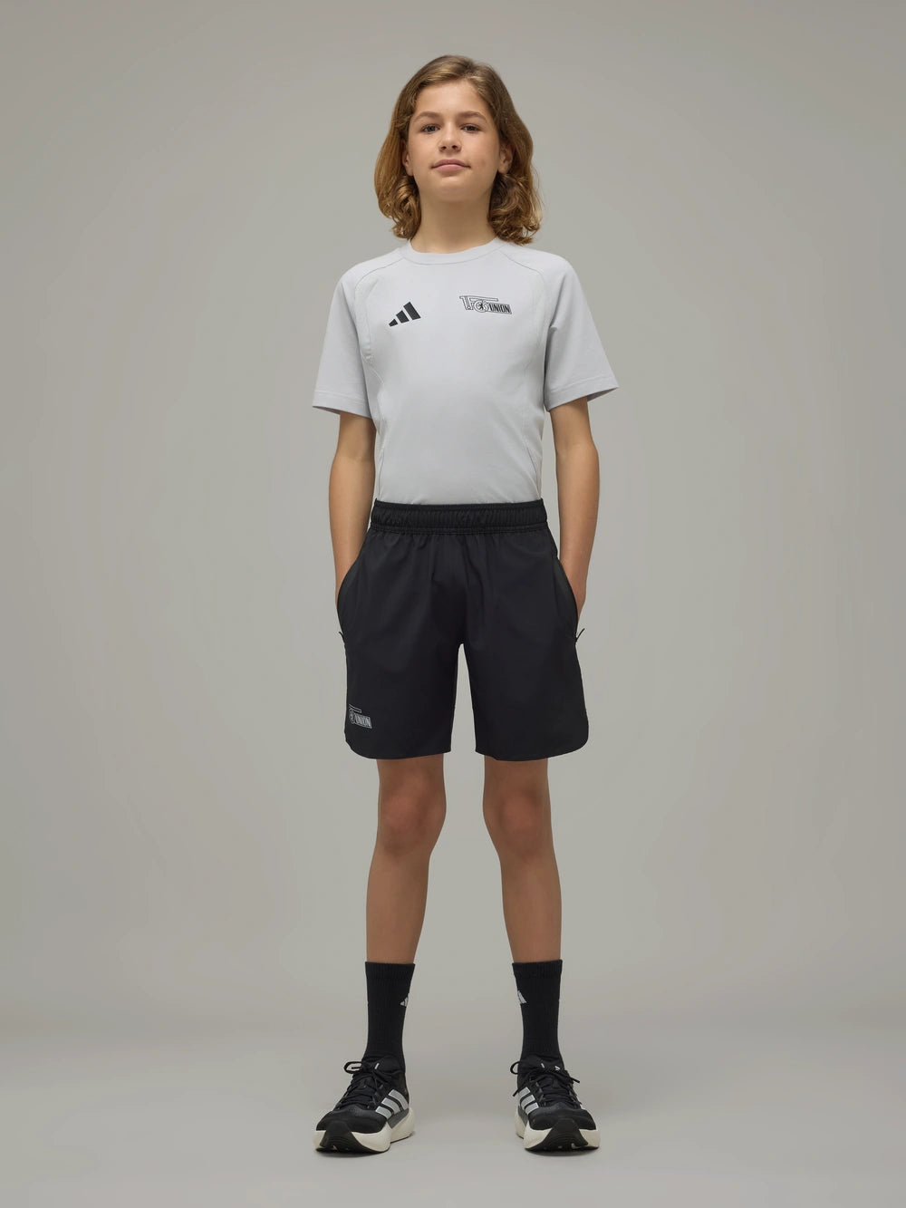 adidas Kinder Ausgehshorts schwarz - Team 26/27